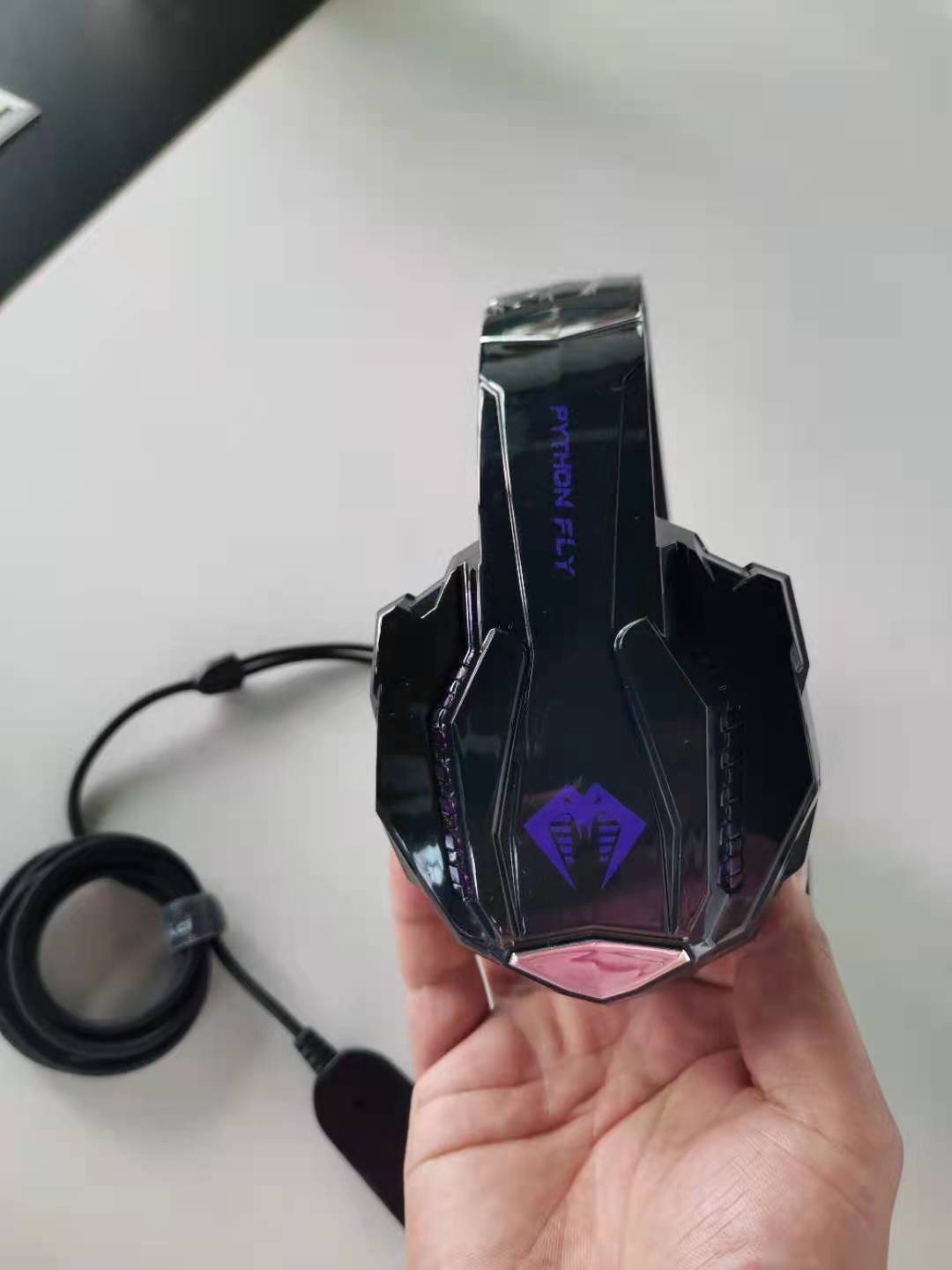 The headphones are actually wired gaming headsets